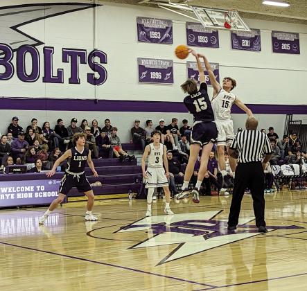 Rye High’s Codah Graber #15 shoots over CSCS player in the contest January 17 on the home court. Courtesy Photo
