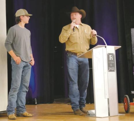 Auctioneer Cody Scheid introducing RHS FFA Vice President Cody Dodge during the labor auction Courtesy Photo