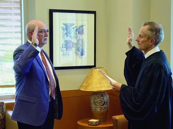 Sixteen-year Pueblo County Sheriff Kirk Taylor is sworn in as the 31st U.S. Marshall for the District of Colorado by U.S. District Court Chief Judge Phillip Brimmer. Courtesy Photo