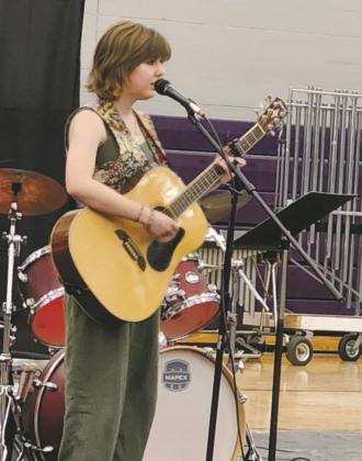An impressive guitar solo at RHS’s Art Show and Concert was dedicated to the performer’s grandfather to wish him a ‘Happy Birthday’. Photo by Shirley Pigg