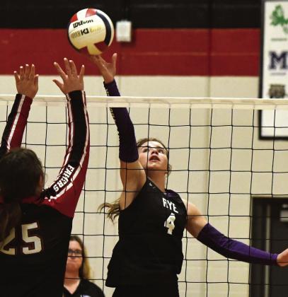 Rye senior Taylor Pye (4) tips a shot over Hoehne's Ayshia Swetky (25) during a 25-12, 25-16, 25-14 sweep of the Santa Fe League rival Lady Farmers at the Class 2A-Region 11 tournament held Friday, November 7, in Ignacio. Photo Courtesy of Joel Priest