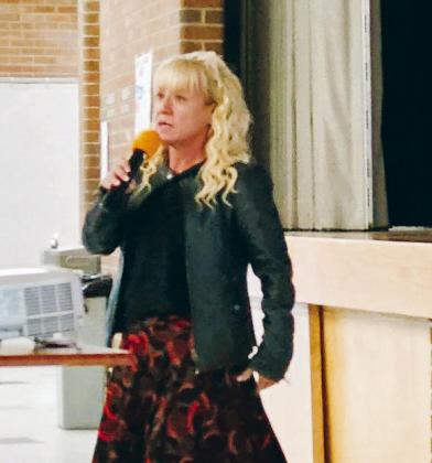 Rye High School Principal Michelle Mann Madril, pictured here announcing at a school assembly, will retire at the end of the 2024 school year. Photo by Shirley Pigg