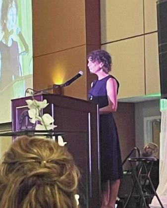 Karen Hopkins presents an acceptance speech for the 2022 Distinguished Service to Education Award received by District 70 educators, at the CSU-Pueblo President’s Blue &amp;amp; Red Gala. Courtesy Photo