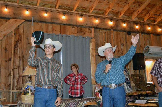 Auctioneer Jake Brunick - courtesy of Deb Straub