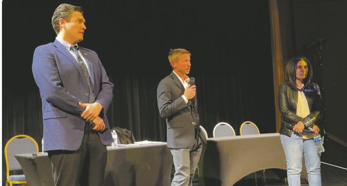 Pueblo County Commissioners (L-R) Miles Lucero, Zach Swearingen, Paula McPheeters give their attention to people attending a forum at the Sangre de Cristo Arts Center.