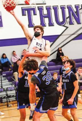 Rye’s T-Bolts had walk-off wins on Dec. 9, 10 and 11 during the Rye High School Varsity Basketball Classic with wins against Pueblo Centennial 50-46, Trinidad 63-27, and Colorado Springs School 64- 30. Sophomore Brandon Benz #24 finished with 12pts vs Pueblo, 6 points vs Trinidad and 11 points vs Colorado Springs School. Photo by Sue Barcus