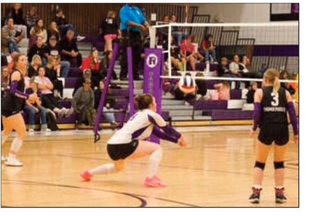 Seine Roy passing, to her left is Taylor Pye and to her right is Trinity Felthager