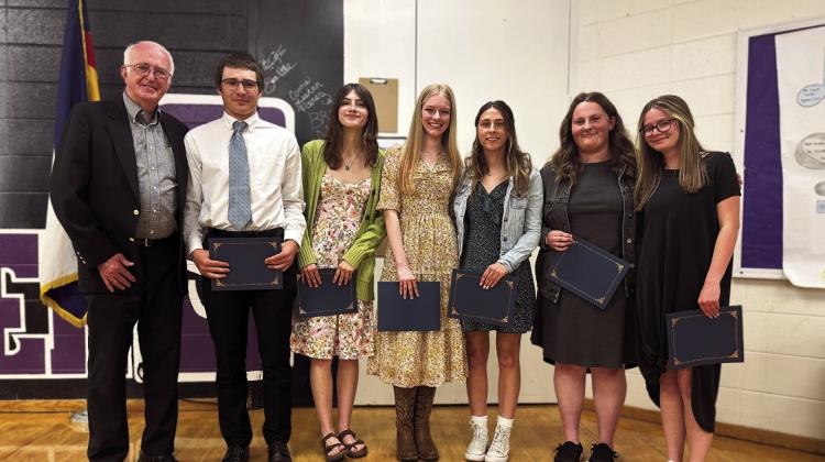 Dennis Maroney, SIEA Board of Director and Rye resident, presents San Isabel Electric Association scholarships to Rye High School students (L-R) Joe Valdez, Sydney Griffith, Harlee Aggson, won additional $1,500, Brianna Prichard, Amelia Burbidge, won additional $4,000, Gianna Baker. Not pictured Solomon Santini, Markus Anglin, Zeb Laca. Courtesy Photo