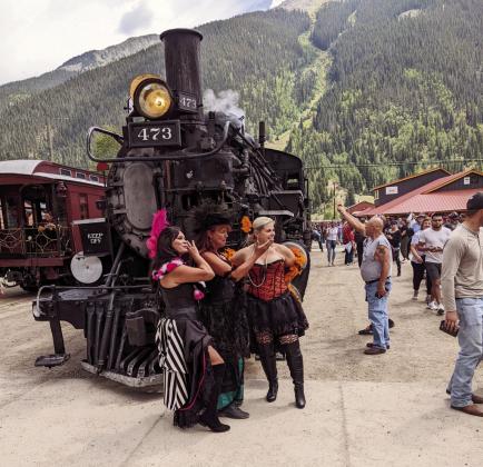 Saloon girls meet the Durango &amp;amp; Silverton Narrow Guage train at Silverton, Colorado Photo by Lori Kraus