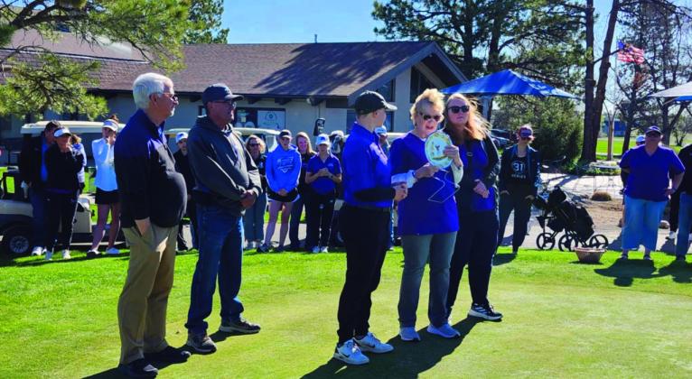 Photo by Shirley Pidd The Rye High School girls' golf team and some of their parents gathered near Ann Bush, Prim Ivan, and Greg Bailey to honor Madeline Mellers memory