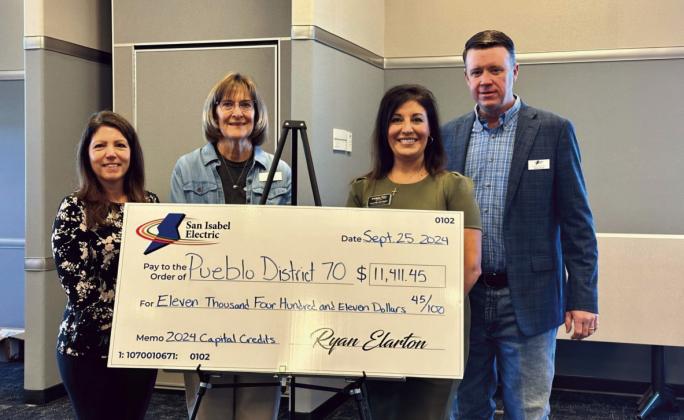 SIEA celebrates 2024 captial credits, (L-R) D70 CFO Amanda Wittman, SIEA Dist. 8 Board Member Doris Morgan, D70 Public Information Officer Lynette Bonfiglio, and San Isabel Electric General Manager Ryan Elarton. Courtesy Photo