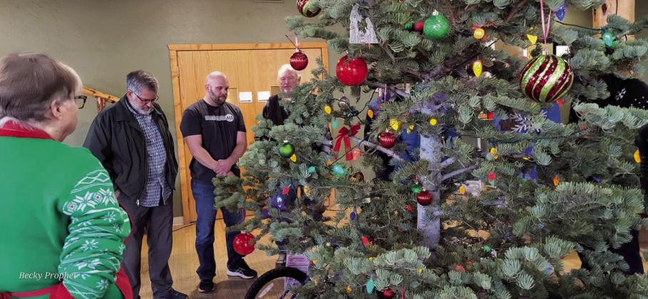 A number of Christians met at Table Mountain Church in Rye, Colorado to pray over the kids receiving the toys that local churches have provided for Hope &amp;amp; Home foster children. Courtesy Photo
