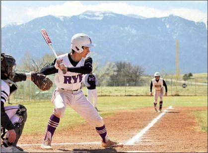 Rye High School batter Will Hamler concentrates on bringing teammate Brandon Benz home from third. Photo by Karen Rochester