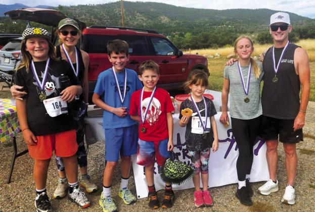 Some of the winners of the Hoof It 4 Harlie 5K: (L-R) Dundy Teeter, Chloe Teeter, Joey Rothschild, James Rothschild, Penny Gallegos, Rosie Christenson, and Rocky Banta. Courtesy Photo