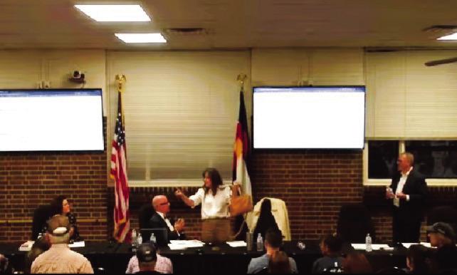 District 70 Board of Education President Ann Bennet called security to remove a District 70 educator just before Bennet herself left the February 24 meeting. Cooler heads prevailed and there was no need for security. Courtesy Photo