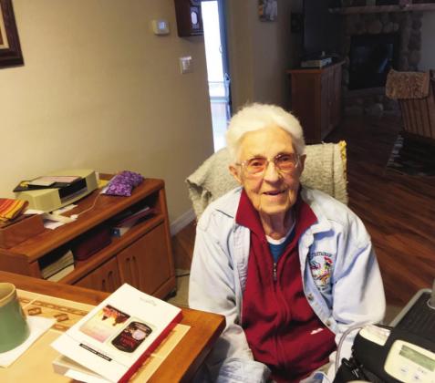 Ninety-eight-year-young Ada Clark offers her study of xeriscaping and water conservation to other Greenhorn Valley homeowners. Photo by Shirley Pigg