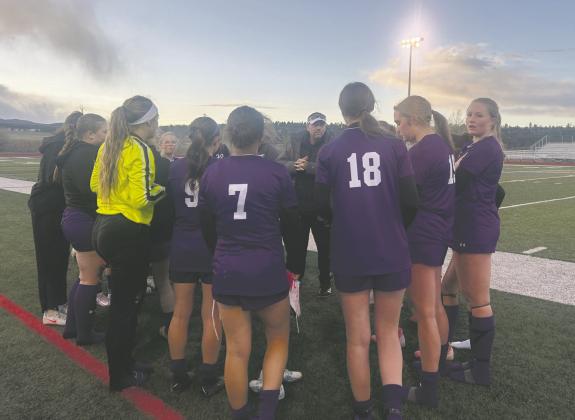 Coach Crowell rallies the girls soccer team against Lamar. Rye tied the 3A powerhouse 2-2 on their home field. Courtesy Photo