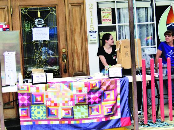 Photo by Shirley Pigg The Rye Cafe closed its interior and sold pizza on the sidewalk to participate in the Town Square Fair.