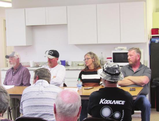 The Colorado City Metro District Board of Directors candidates field questions from the community at a packed-house meeting on Thursday. Results at www.greenhornvalleyview.com. Photo by Shirley Pigg