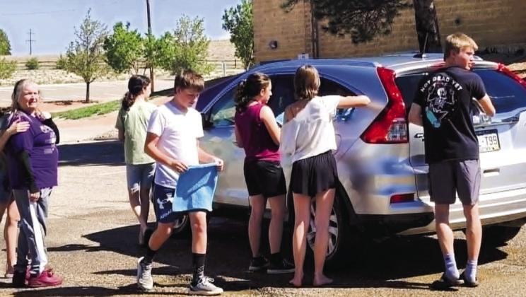 Students turned on the water and suds to help support the Thunderbolt Music Program on Saturday, May 16 at Craver Middle School. Photo by Shirley Pigg