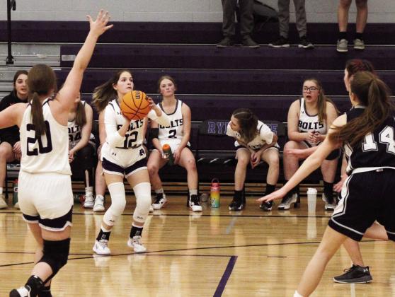 Morgan Gallegos, #12, scores a basket against Peyton. Photo by Karen Rochester