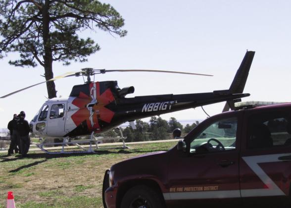 The Rye Fire Protection District, Pueblo County Sheriff's Office, and Flight for Life helicopter took over the Rye High School’s parking lot on Thursday, April 7 from 9-11 am. These amazing organizations set up a simulated “prom night” car crash to remind students to be safe while driving to and from their upcoming prom. Photo by Shirley PIgg