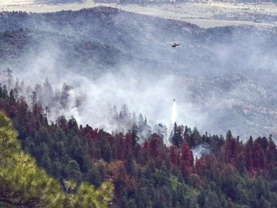 Aerial resources including a helicopter and a Tanker 10, a fixed wing aircraft, are currently engaging in bucket drops to assist with the Oakridge Fire. Courtesy Photo