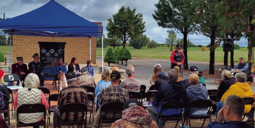 Don Shumake, a decorated veteran, shares memories of his family and their military service at the Colorado City ceremony hosted by the LTC Fred A. Ettleman Veterans of Foreign Wars Post 7305 on Monday. Shirley Pigg