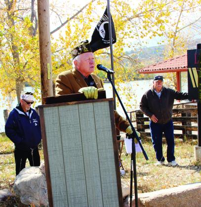 Jimmy Porter, current Senior Vice Commander of Post 7305 welcomes the audience and introduces speaker Master Sergeant Garry Melchi (L). Photo by Terry Kraus