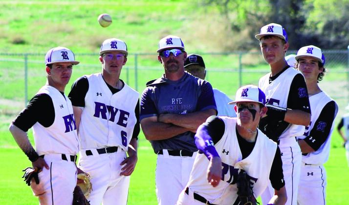 Taye McCauley, #12, comes in to relieve Joe Valdez in the third inning of baseball action against Rocky Ford. McCauley gave up one hit, walked one, and struck out five in his 2 and 2/3 inning appearance. Photo by Karen Rochester