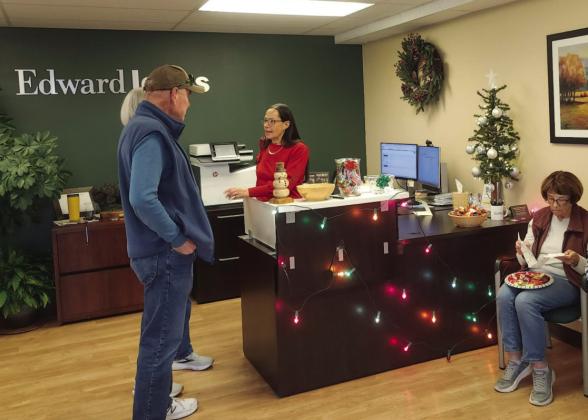 Nicole Hamler greeted clients at the Edward Jones Holiday Open House Photo by Shirley Pigg