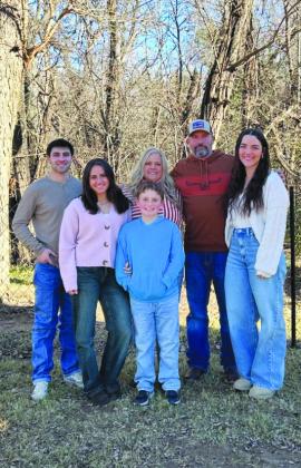 The Crowell family ( Back L- R) son Aidan Velez, daughter Averi- Velez, Marla Crowell, John Crowell, daughter Emily Crowell, ( Front) Son Jace Crowell. ( not pictured, son Evan Crowell) Courtesy Photo