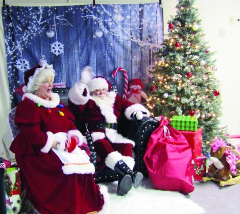 Mr. &amp;amp; Mrs. Claus took time out to greet youngsters at the Colorado City Rec Center following the parade on Saturday evening. Photo by Shirley Pigg