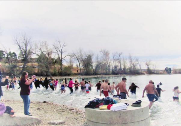 2021 Year in Review, Fourth Quarter - Best Photograph Runner-up, by Staff Photograher Shirley Pigg. November 20, 5th Annual Maggie Drew Peters Polar Plunge, RHS Scholarship fundraiser. Photo by Shirley Pigg