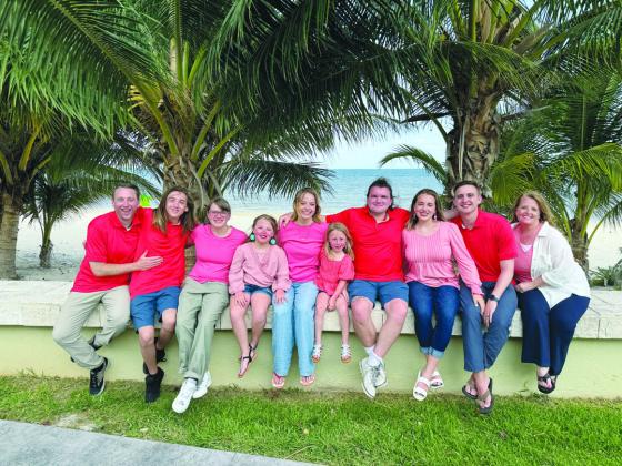 New Rye High School Principal Matt Dejong (L) and wife, Lisa (R), with their family while vacationing in Cancun. Courtesy Photo