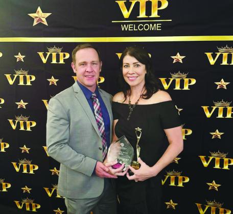 Misty Sprague, with husband Josh, receives the Community Service Award for her work as Executive Director of Colorado City’s Valley First. Courtesy Photo