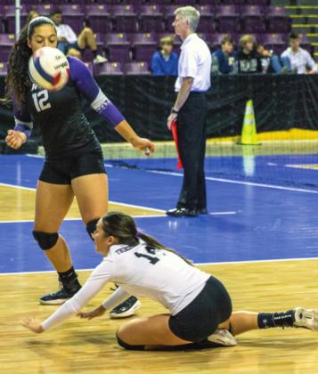Gracie Graham #14 and Jordan Holgerson catching a hard serve at State Championships. Photo by Sue Barcus
