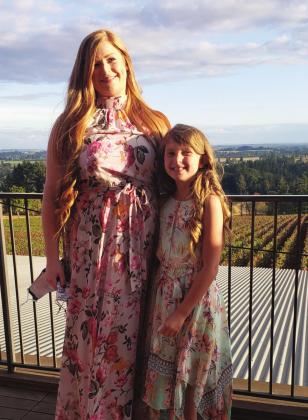New Rye Town Clerk Jocelyn Mower, pictured with daughter Olivia, strives to fill the shoes of previous clerk Sherri Beach. Courtesy Photo