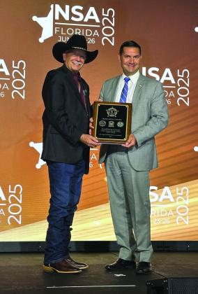 Sheriff Lucero (R) receiving the agency’s recent Triple Crown accreditation from National Sheriff’s Association President Kieran Donahue Courtesy Photo