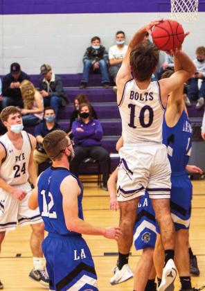 The T-Bolts started out with a close lead in the first half at 28-20 vs Las Animas on Friday, Jan. 21, then turned on their “A” game and beat the Trojans 60-37 during a home conference game. Dillon Robertshaw #10 had 2 three-pointers with a total of 8 points, 1 assist and 4 rebounds. Rye is now 7-3 overall. Photo by Sue Barcus