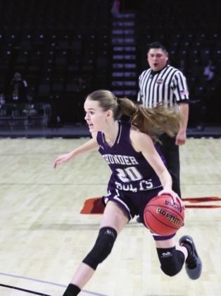 Sophie Adamson sets up a play in a hotly contested game for the third place trophy in which the Thunderbolts defeated Limon. Photo by Diane Elarton