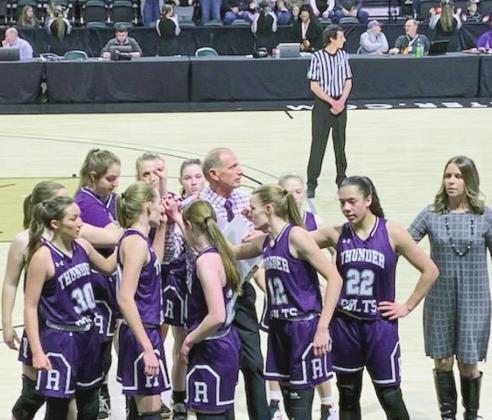 With time running out, Head Coach Kermit Spencer gathers the team and plans a final series of plays that will make or break the chance for victory at the 2A State Championship Tournament held in Loveland. Photo by Diane Elarton
