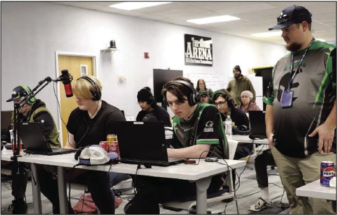 Coaches Spencer and Scott Elliot have pioneered a program that is leading to big money scholarships and a notable improvement in academic engagement and outcomes. Courtesy Photo