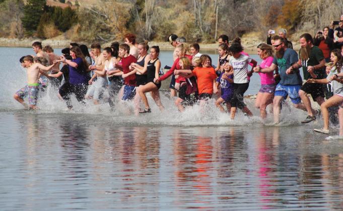 The Fifth Annual Maggie Drew Peters Polar Plunge took place Saturday at Lake Beckwith to raise scholarship funds for Rye High School students, and as a memorial to Maggie Peters. Photo by Emily Colton