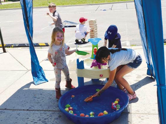 Participants of the Summer Reading Kickoff Party enjoyed games and lunch before selecting books to read Photo by Shirley Pigg