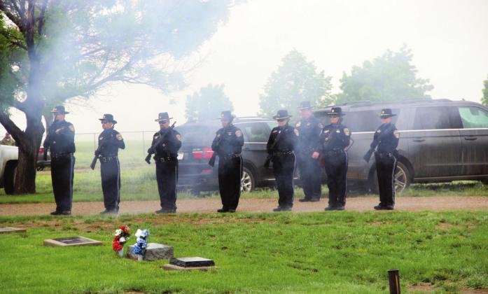 2021 Year in Review, Best Photograph, by Terry Kraus on a rainy day in May Memorial Service at the Colorado City Cemetery. Photo by Terry Kraus