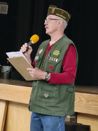 VFW Sr. Vice Commander Jerry Collins welcomed the students to the assembly explaining Memorial Day. Photo by Shirley Pigg