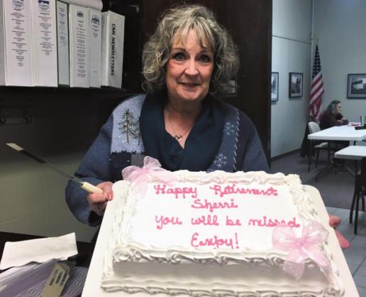 Sherri Beach, retired Rye Town Clerk, was presented with a cake from the board and mayor in honor of her service to the community. Courtesy Photo