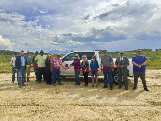 San Isabel Electric conducts a ribbon cutting for land near Walsenburg gifted to Springs Truck Driving School Courtesy Photo