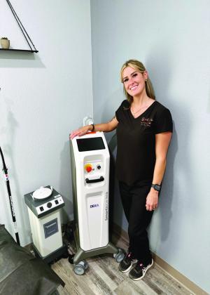 Owner/Operator Brandi Olson introduces Co2 Laser therapy availability to her clients. Courtesy Photo